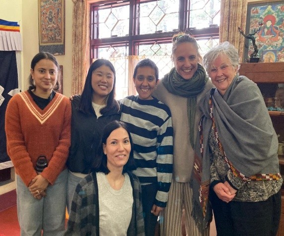 Clara, the course meditation leader, and assorted wonderful volunteers with Ondy